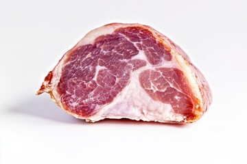 Freshly cut raw meat lying on a clean white surface, ideal for culinary or still life photography