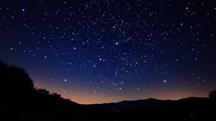 Naklejka premium Celestial Night Landscape: A breathtaking panoramic view of a star-studded night sky over a silhouetted mountain range, capturing the serene beauty and vastness of the cosmos. 