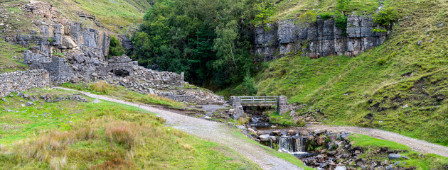 Footbridge at Fair Yew End in the Swinner Gild, which is a wild and remote area in the Swaledale in the Yorkshire Dales National Park.