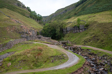 Footbridge at Fair Yew End in the Swinner Gild, which is a wild and remote area in the Swaledale in the Yorkshire Dales National Park.