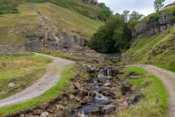 Footbridge at Fair Yew End in the Swinner Gild, which is a wild and remote area in the Swaledale in the Yorkshire Dales National Park.