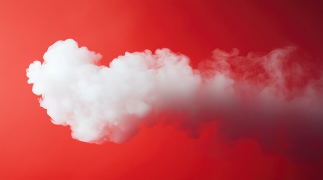 White smoke cloud on vibrant red background creating a dramatic and striking visual effect for creative design and advertising applications