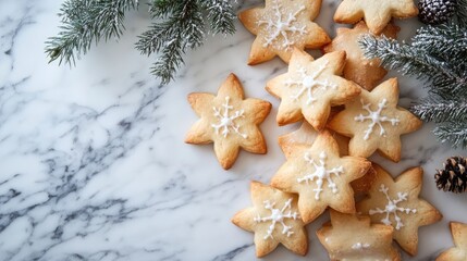 Rustic star-shaped cookies decorated with snowflakes on a marble surface surrounded by winter greenery and pinecones