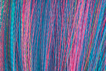 Colorful Threads in Vibrant Stripes for Creative Background Design