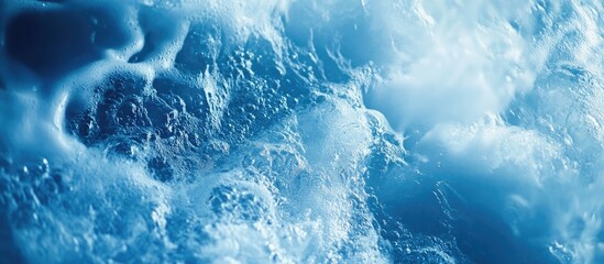 Shower head with flowing water in calming blue hues ideal for bathroom design inspiration and renovation ideas