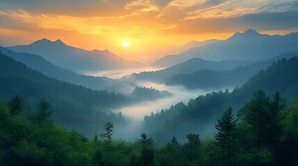Obraz premium Majestic sunrise over misty mountain valley.