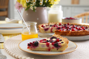 Piece of delicious currant pie on table indoors, closeup