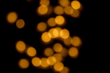 Obraz premium golden bokhe at night,Beautiful blurred light bokhe for background material.
