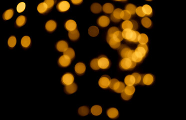 golden bokhe at night,Beautiful blurred light bokhe for background material.