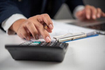 Accounting and payroll systems, featuring calculators, bank documents, and payment processing. Businesses dealing with money management, loan applications, and tax services financial solutions