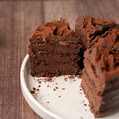 Indulge in this rich, decadent chocolate cake featuring multiple layers of velvety cocoa delight, perfectly moist and expertly crafted to satisfy your sweet tooth and dessert cravings.