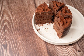 Decadent Chocolate Layer Cake: A Sweet Treat with Rich Layers of Cocoa and Creamy Texture for the Perfect Dessert Indulgence