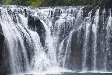 Tranquil beauty of Shifen waterfall in Taiwan forest