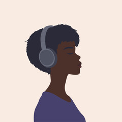 afro person listening music with headphone 
