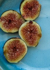 Fresh figs on a blue plate