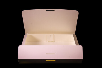 Blank package mockup. White paper box on black plaster background. Top view.