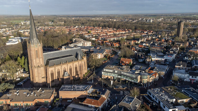 Raalte, the Netherlands - January 10th 2025: Aerial photo of the 'Basiliek van de Heilige Kruisverheffing' Basilica of the Holy Cross Exaltation.