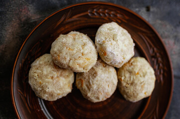 Homemade Frozen Meat Cutlets on a Rustic Clay Plate, Top View