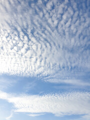 Photo of white clouds with blue sky. The weather is very sunny.