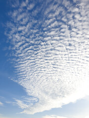 Photo of white clouds with blue sky. The weather is very sunny.