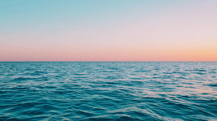 Fototapeta premium Serene Ocean Horizon at Dusk with Calm Water and Pastel Sky