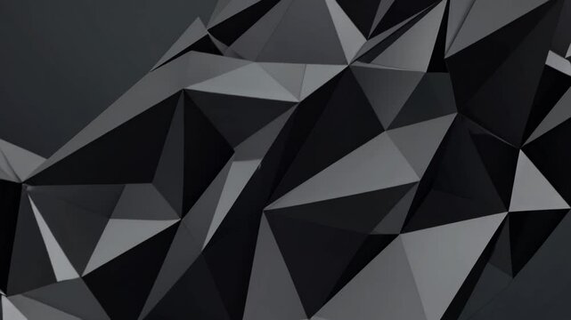 Geometric patterns of black and gray triangles create a textured visual experience in an abstract design