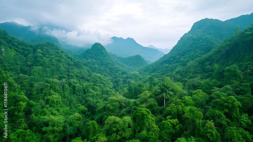 Aufkleber panoramic view of lush green mountains and clouds in tropical rainforest landscape : generative ai