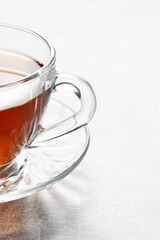Cup of tea on white background, closeup, macro.