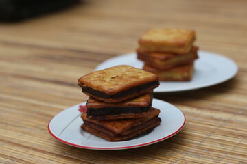 Delicious Chocolate Sandwich Crackers on Wooden Table