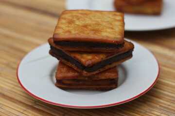 Delicious Chocolate-Filled Crackers Stacked on a Plate