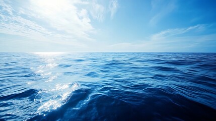 Obraz premium Vast Aerial View of Tranquil Blue Ocean Under Clear Sky with Sunlight Reflection : Generative AI