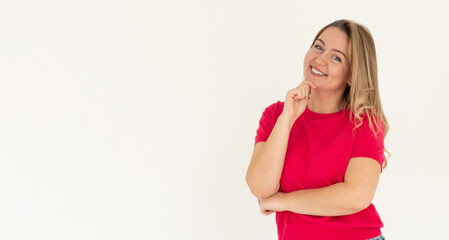 Portrait of young stylish girl smiling with hand on cheek looking at camera. Copy space. Isolated on white