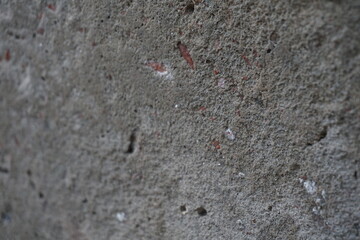 Damaged cement concrete wall texture background, rusty uneven cement wall surface, Grungy abstract wall backdrop