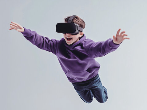 Virtual Reality Flight: A young boy wearing a VR headset, eyes wide with excitement, leaps into the air with outstretched arms, his virtual reality experience taking him on a thrilling journey.