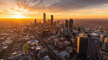 Fototapeta premium Cityscape sunset aerial view, urban sprawl, golden hour. Use travel brochure.