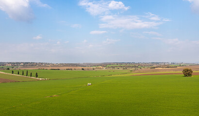 Fototapeta premium Winter panoramic view in Israel of green fields, mountains and villages