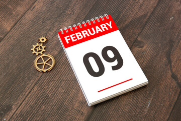 Save the Date written on a calendar - February 09