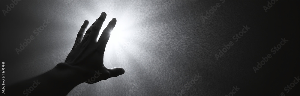 Poster A Hand Reaches For A Soft Focus Light Source Against A Textured Black And White Background With Ample Copy Space Available. 00001