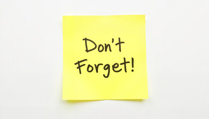 Bright yellow sticky note with reminder on clean white surface, organization, National Memo Day