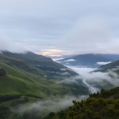 Fototapeta premium Misty mountain valley sunrise.