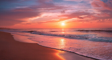 Fototapeta premium Serene Beach at Sunset – Gentle Waves and a Sky of Warm Hues