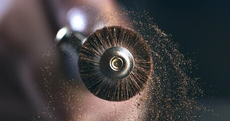 Super Slow Motion of Rotating Polishing Brush Releasing Dust and Metal Particles in Workshop - Close-Up of Abrasive Tool in Action During Jewelry Finishing Process at 1000 fps. - Powered by Adobe
