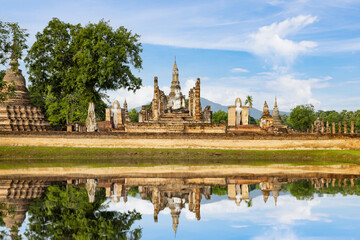 Panorama of ancient Buddha statue and ruin of temple of Wat mahathat temple in Sukhothai Historical Park, which also one of UNESCO Heritage Site