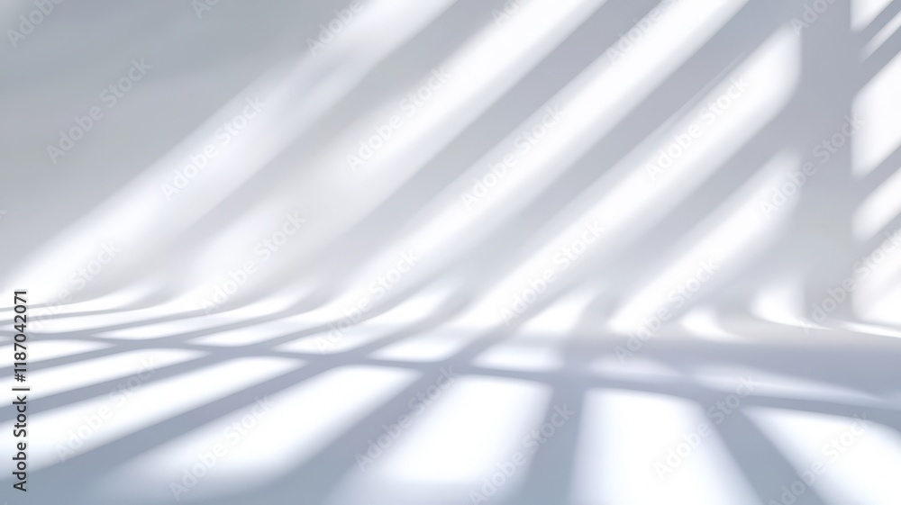 Poster sunlight is streaming through window and creating shadows on white wall in empty room with white flo