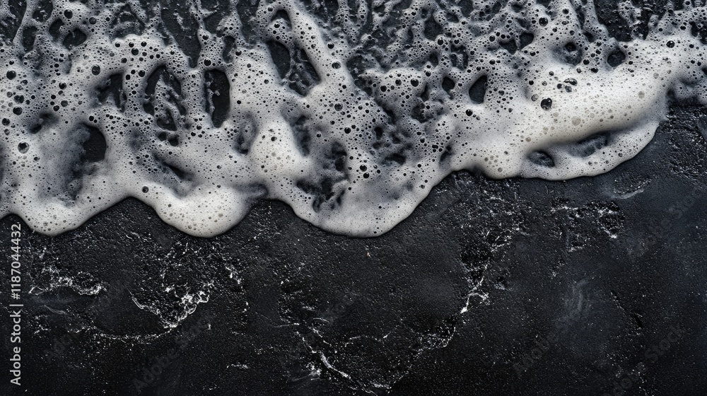 Poster aerial view of volcanic ash foam on dark surface creating natural abstract pattern for creative desi