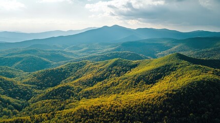 Fototapeta premium Aerial view of lush green mountains in autumn with technology elements and ample space for text placement ideal for promotional content
