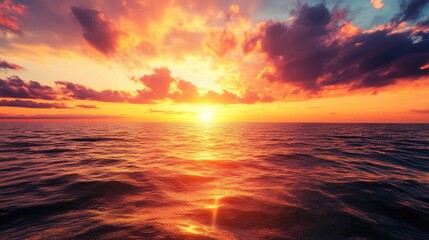 Obraz premium Breathtaking subtropical sunset over tranquil sea with vibrant colors and dramatic clouds reflecting on the water surface