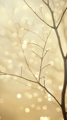 Delicate, bare branches reach out against a background of shimmering golden bokeh, creating a serene and magical atmosphere glittery and shiny, soft focus