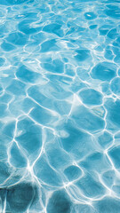 Obraz premium Clear blue water surface with gentle ripples and reflections