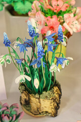 Original flowers made of polymer clay. The most realistic display. Soft focus. Close-up.